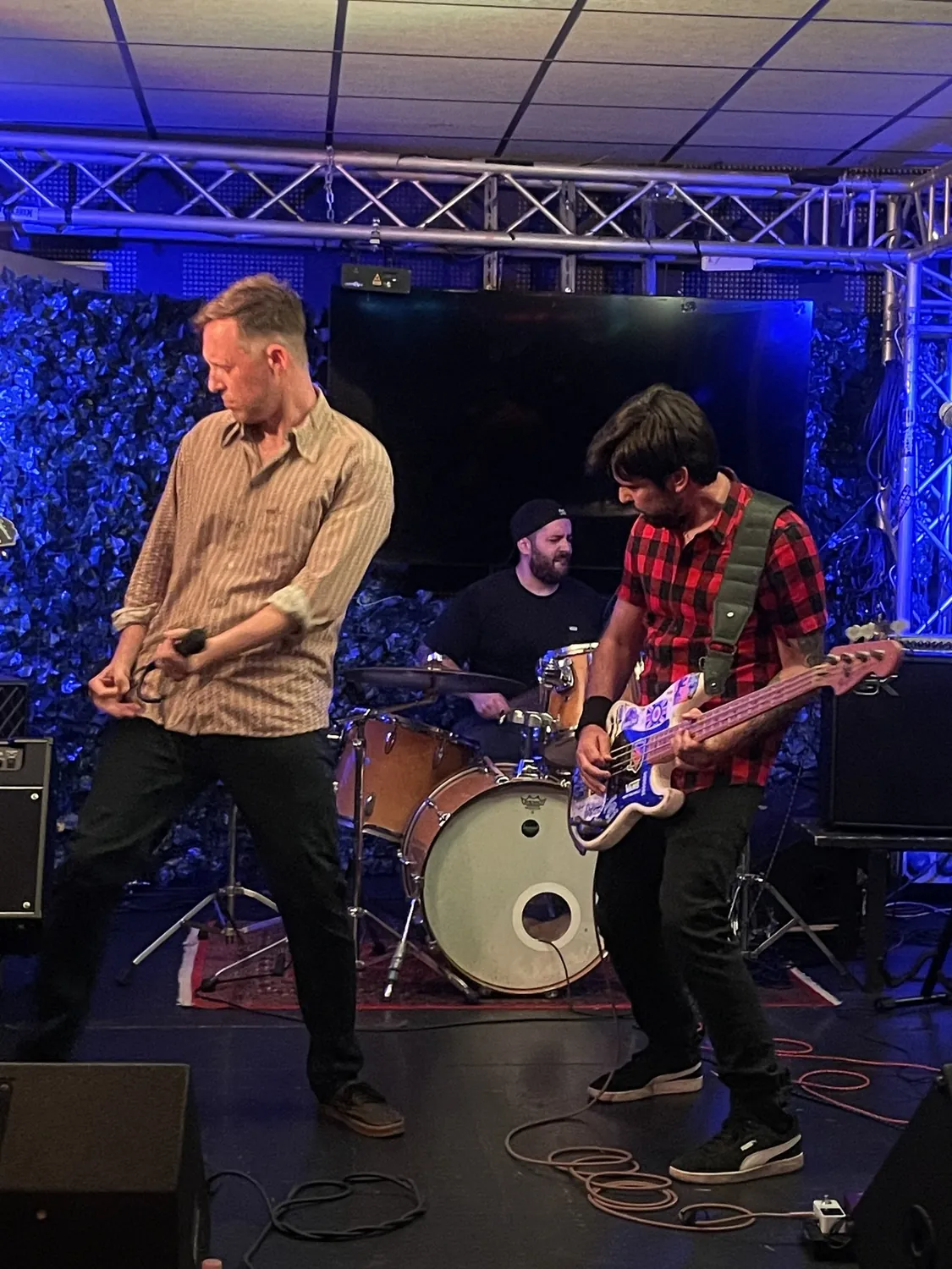 Bass player and drummer live